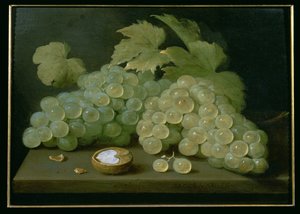 Grapes with half a walnut